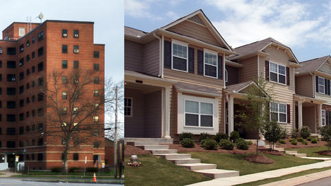 picture of old highrise building next to townhomes