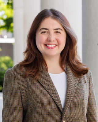 Cassidy Shubatt headshot in front of Littauer