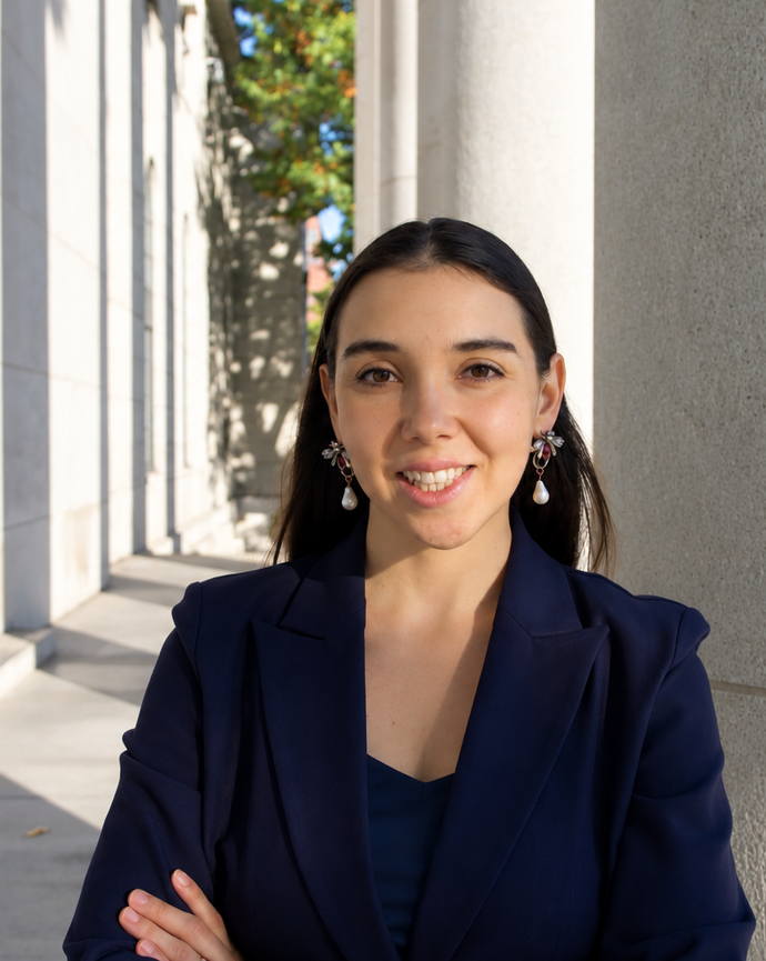 Andrea Neyra-Nazarett in front of the columns of Littauer Center