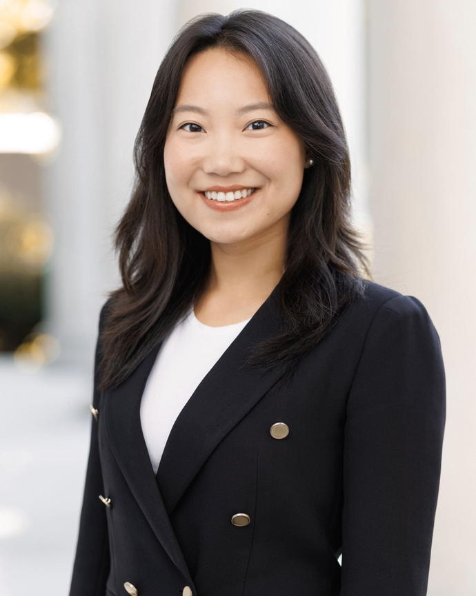 Ruby Zhang in front of the columns of Littauer Center
