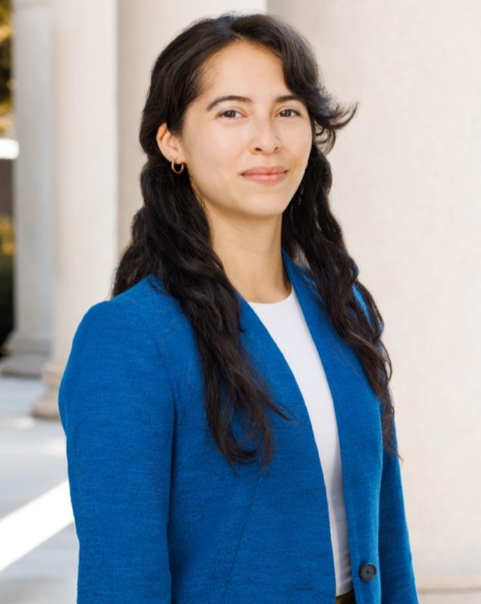 Coly Elhai in front of the columns of Littauer Center